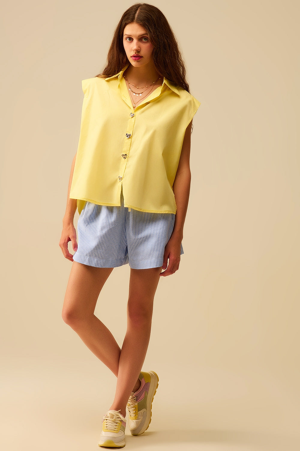 Yellow Sleeveless Blouse with Heart-shaped Buttons
